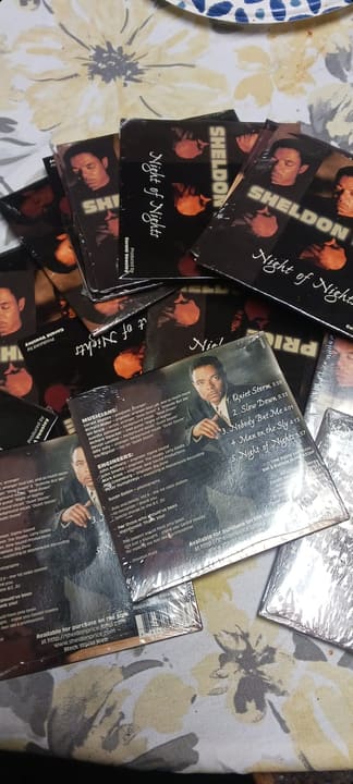 Night of Nights CDs spread across a table